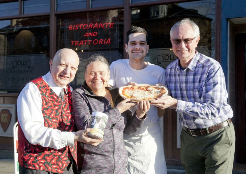 Slice of pizza profit handed over to help Tanzanian families