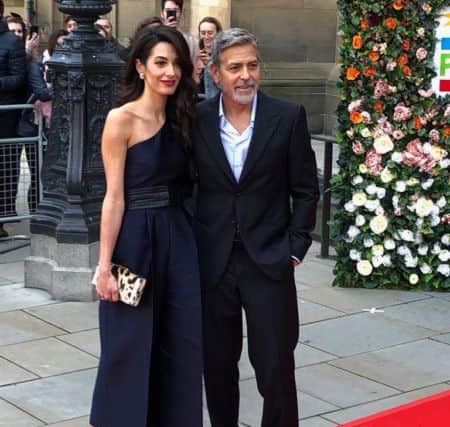 Video: George and Amal Clooney greet crowds in Edinburgh at charity gala
